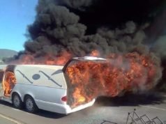 Chaos as a hearse catches fire while transporting the body to a funeral: Pics White Hearse