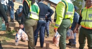 Police raid Diepkloof hostel in Soweto in search of looted goods