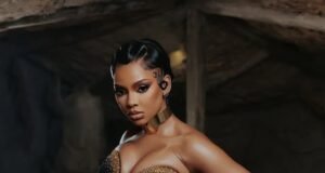 Mihlali Ndamase shines in gold and black at Durban July 2025