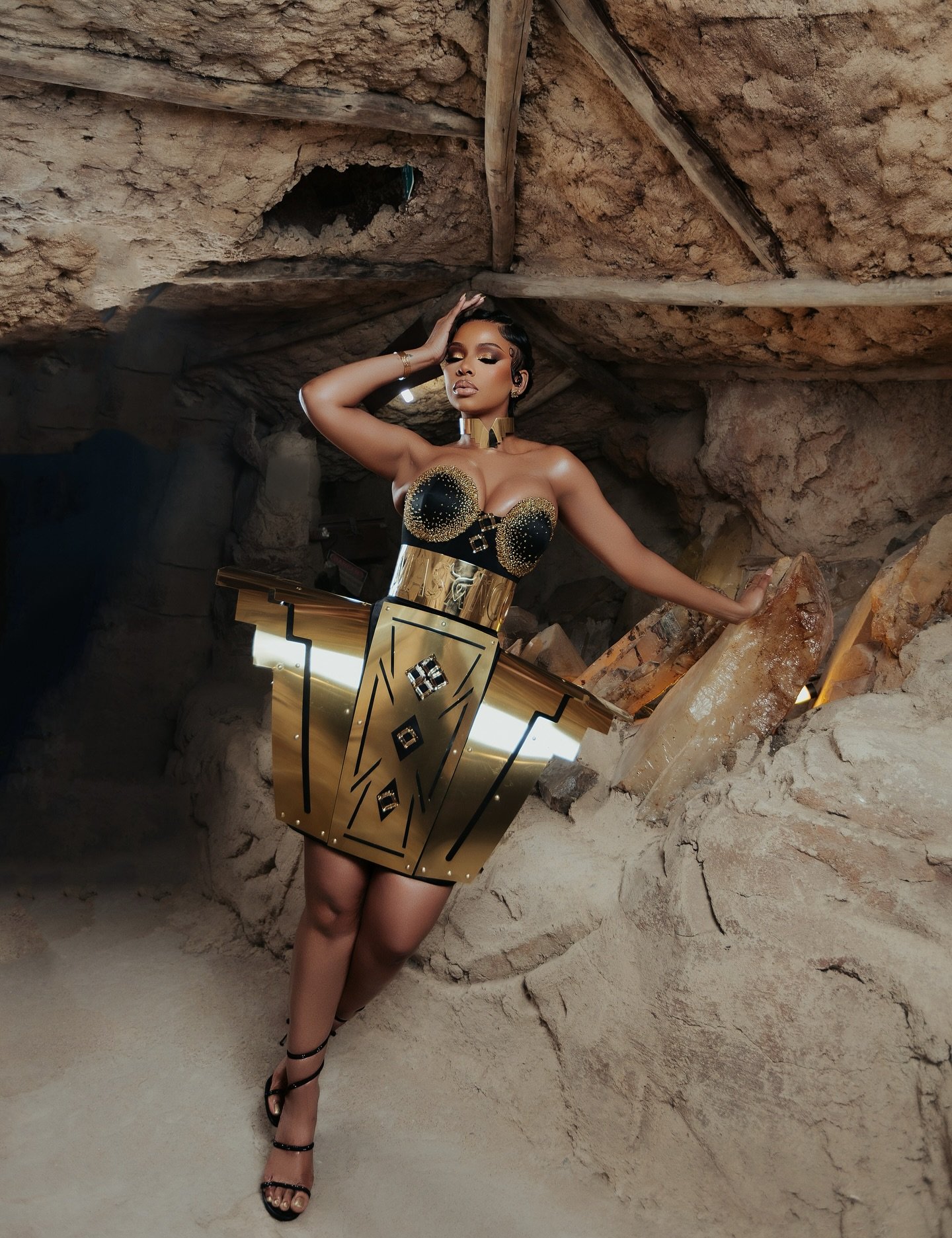 Mihlali Ndamase shines in gold and black at Durban July 2025