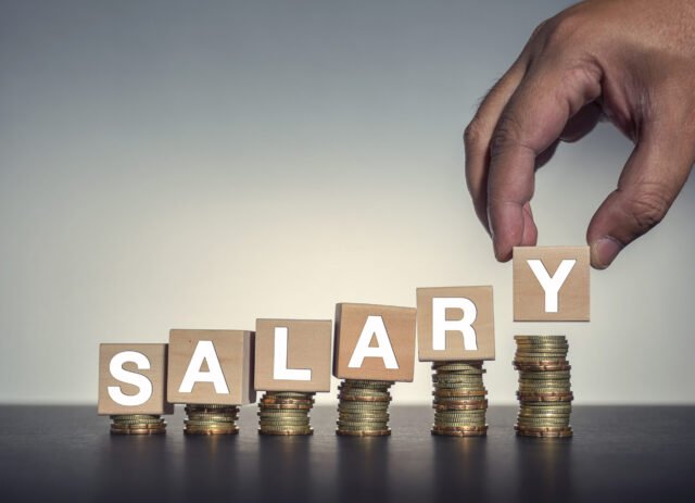 Coin,Stacks,With,Letter,Wooden,Blocks,-,Salary Salary